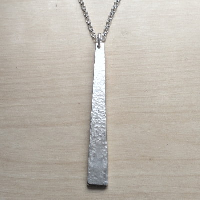 Wedge, hammered silver pendant